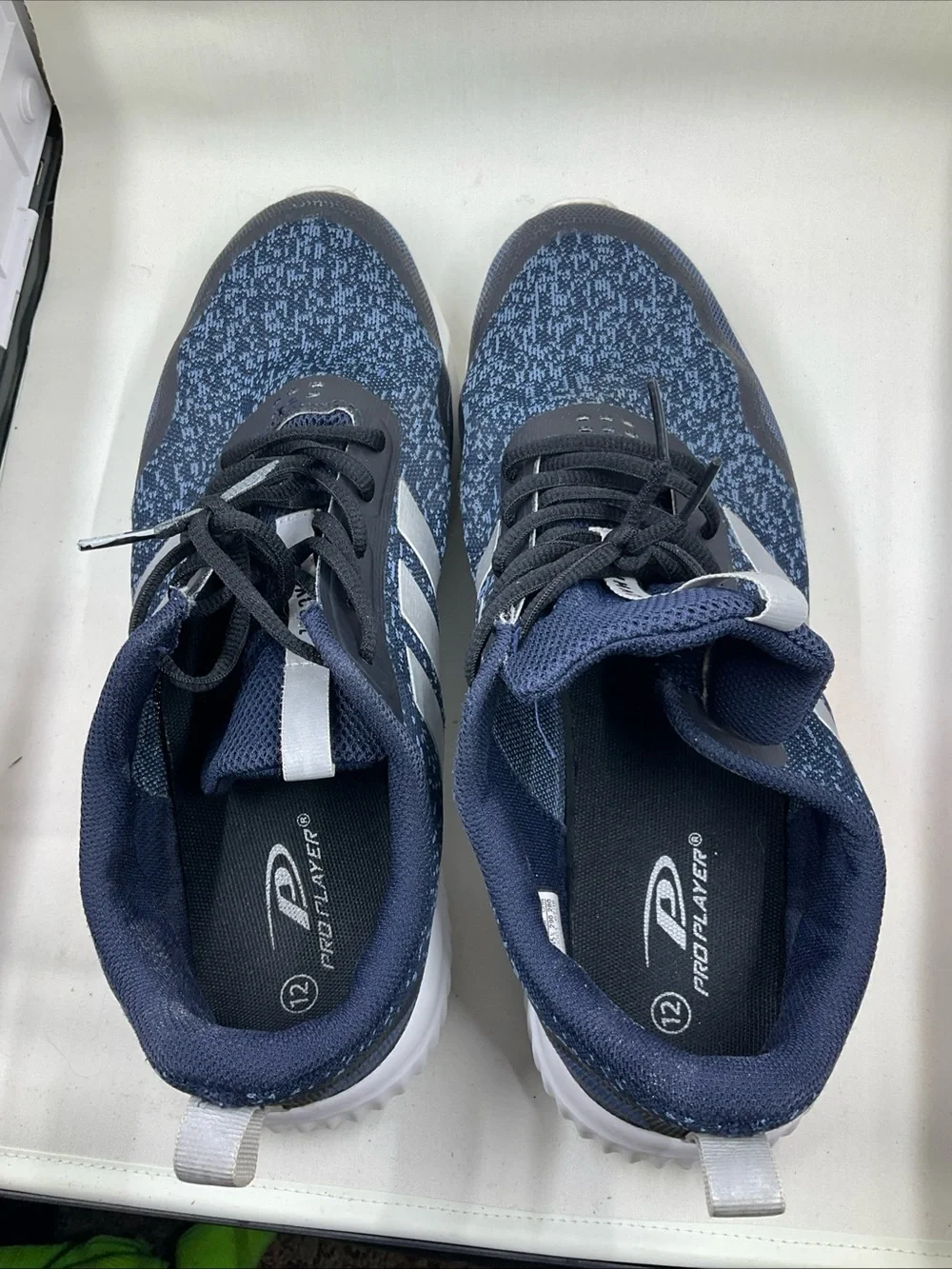 adidas Men's Navy Blue Athletic Shoes with Silver Stripes and Orange Accent
